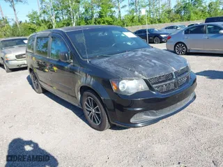 2015 Dodge Grand Caravan SE with VIN 2C4RDGBGXFR651312, listed as a IAAI auction lot 42033161 with 98,750 mi miles. Bid and sale history available at carsss.com. Image 1.