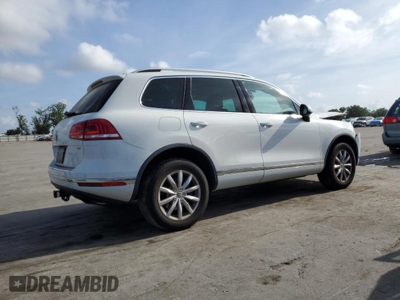 2017 Volkswagen Touareg Sport with VIN WVGEF7BP0HD006792, listed as a Copart auction lot 47895813 with 52,432 mi miles and . Bid and sale history available at DreamBid. Image 3.