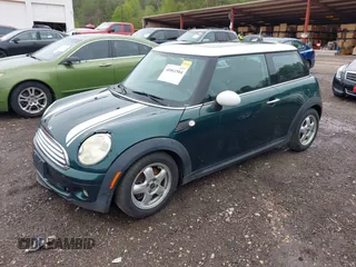 2009 MINI Hardtop z VIN WMWMF33579TW72493, wystawiony jako IAAI lot #41861584 z przebiegiem 136 341 mil mil oraz . Historia ofert i sprzedaży dostępna na DreamBid. Obrazek 2.