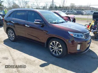 2014 Kia Sorento SX with VIN 5XYKW4A73EG458059, listed as a IAAI auction lot 41860159 with 140,644 mi miles. Bid and sale history available at carsss.com. Image 1.