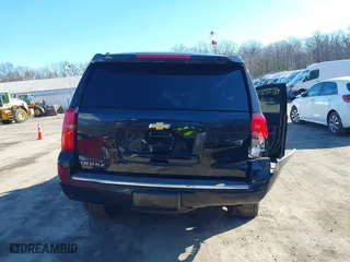 2015 Chevrolet Tahoe LTZ with VIN 1GNSKCKC6FR190314, listed as a IAAI auction lot 41672237 with 176,439 mi miles. Bid and sale history available at carsss.com. Image 16.