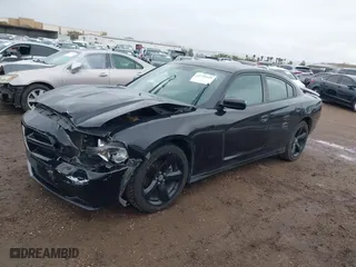 2013 Dodge Charger SXT Plus with VIN 2C3CDXHG1DH620101, listed as a IAAI auction lot 41755409 with 186,939 mi miles. Bid and sale history available at carsss.com. Image 2.