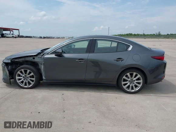 2023 Mazda 3 S Premium with VIN 3MZBPBDM3PM383238, listed as a IAAI auction lot 42477596 with 24,233 mi miles and . Bid and sale history available at DreamBid. Image 14.
