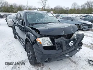 2018 Nissan Frontier PRO-4X with VIN 1N6AD0EV2JN765323, listed as a IAAI auction lot 41610141 with 82,695 mi miles. Bid and sale history available at carsss.com. Image 1.