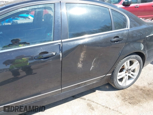 2009 Pontiac G8 with VIN 6G2ER57769L185606, listed as a IAAI auction lot 42112142 with 187,365 mi miles. Bid and sale history available at carsss.com. Image 6.