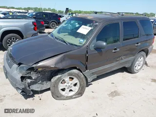 2007 Ford Escape XLT with VIN 1FMYU03167KA10635, listed as a IAAI auction lot 42009859 with 1 mi miles. Bid and sale history available at carsss.com. Image 2.