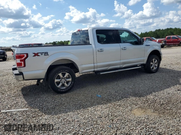 2018 Ford F-150 XL with VIN 1FTFW1EG3JFB90993, listed as a Copart auction lot 64446865 with 63,295 mi miles and Salvage title. Bid and sale history available at DreamBid. Image 3.