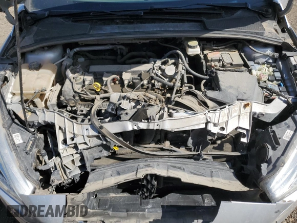 2017 Ford Focus SE z VIN 1FADP3F24HL308294, wystawiony jako Copart lot #56516265 z przebiegiem 80 431 mil mil oraz Szkoda całkowita • Salvage title. Historia ofert i sprzedaży dostępna na DreamBid. Obrazek 11.