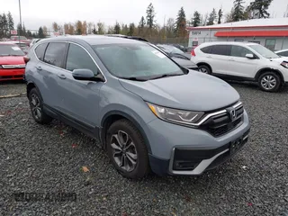 2021 Honda CR-V EX with VIN 2HKRW2H56MH641938, listed as a IAAI auction lot 40795839 with 55,312 mi miles. Bid and sale history available at carsss.com. Image 1.