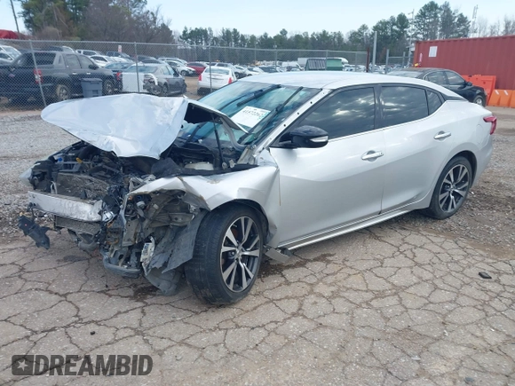 2016 Nissan Maxima SV with VIN 1N4AA6AP7GC439288, listed as a IAAI auction lot 41572262 with 223,185 mi miles and . Bid and sale history available at DreamBid. Image 2.