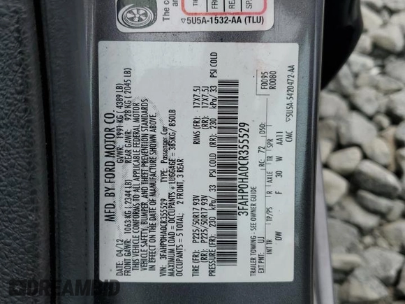 2012 Ford Fusion SE with VIN 3FAHP0HA0CR355529, listed as a Copart auction lot 62585515 with 113,094 mi miles and Salvage title. Bid and sale history available at DreamBid. Image 12.