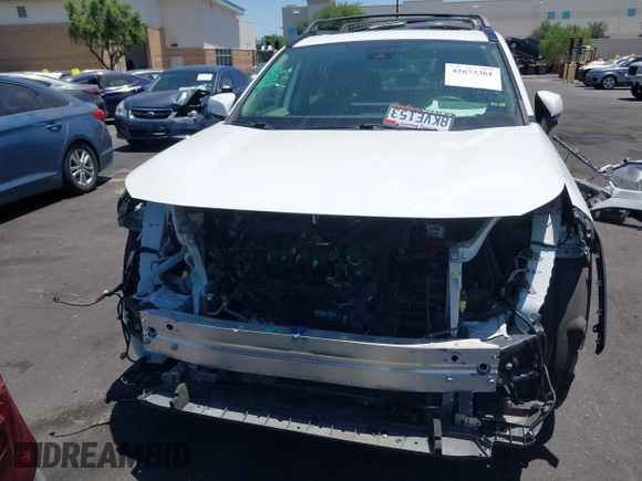 2019 Toyota RAV4 XLE with VIN JTMP1RFV8KD025971, listed as a IAAI auction lot 42673361 with 69,241 mi miles and . Bid and sale history available at DreamBid. Image 13.