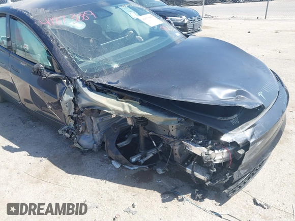 2024 Tesla Model 3 z VIN 5YJ3E1EA5RF843972, wystawiony jako IAAI lot #41873089 z przebiegiem 9 788 mil mil oraz . Historia ofert i sprzedaży dostępna na DreamBid. Obrazek 6.