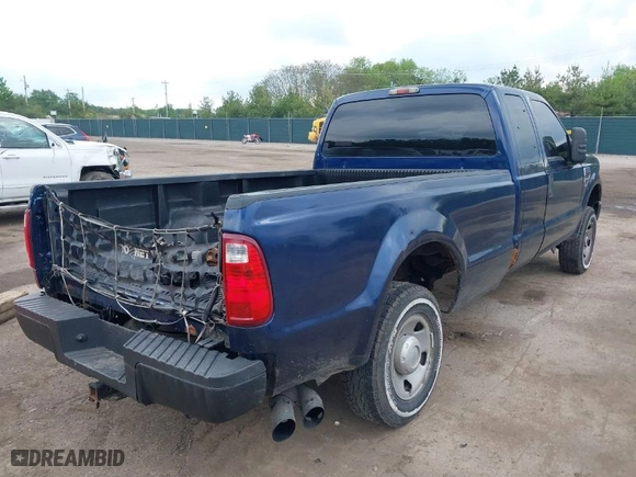 2009 Ford Super Duty F-250 SRW XL with VIN 1FTSX21R89EA60895, listed as a IAAI auction lot 39419254 with 154,411 mi miles. Bid and sale history available at carsss.com. Image 4.