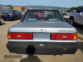 1986 Toyota Camry z VIN JT2SV12E3G6021210, wystawiony jako Copart lot #49623985 z przebiegiem 144 064 mil mil oraz Czysty tytuł • Clean title. Historia ofert i sprzedaży dostępna na DreamBid. Obrazek 6.