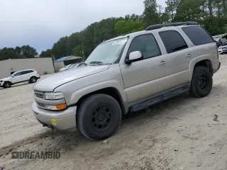 2004 Chevrolet Tahoe Z71 z VIN 1GNEK13Z44R173285, wystawiony jako Copart lot #56220015 z przebiegiem 318 135 mil mil oraz Szkoda całkowita • Salvage title. Historia ofert i sprzedaży dostępna na DreamBid. Obrazek 1.