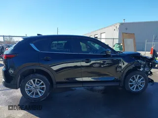 2023 Mazda CX-5 2.5 S with VIN JM3KFBAM9P0230299, listed as a IAAI auction lot 41656657 with 17,290 mi miles. Bid and sale history available at carsss.com. Image 14.
