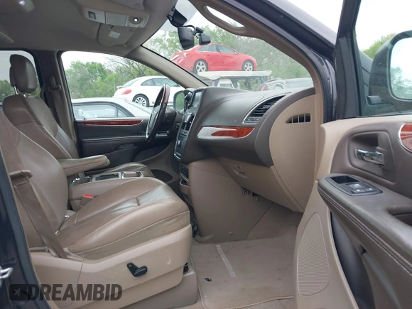 2014 Chrysler Town & Country Limited with VIN 2C4RC1GG3ER188114, listed as a IAAI auction lot 42082618 with 193,562 mi miles and . Bid and sale history available at DreamBid. Image 5.