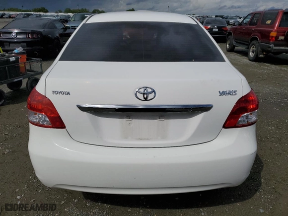 2010 Toyota Yaris with VIN JTDBT4K3XA1360659, listed as a Copart auction lot 51490475 with 210,967 mi miles and Salvage Title. Bid and sale history available at carsss.com. Image 6.
