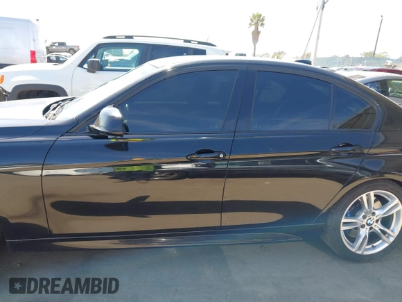 2014 BMW 3 Series 328i with VIN WBA3C1C54EK117252, listed as a IAAI auction lot 42338440 with 126,877 mi miles and . Bid and sale history available at DreamBid. Image 14.