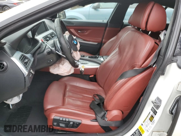 2014 BMW 6 Series 650i xDrive z VIN WBA6B4C54ED371324, wystawiony jako Copart lot #49016325 z przebiegiem 113 395 mil mil oraz Szkoda całkowita • Salvage title. Historia ofert i sprzedaży dostępna na DreamBid. Obrazek 7.