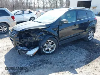 2014 Ford Escape Titanium with VIN 1FMCU9JX2EUA96338, listed as a IAAI auction lot 41806850 with 127,745 mi miles. Bid and sale history available at carsss.com. Image 17.