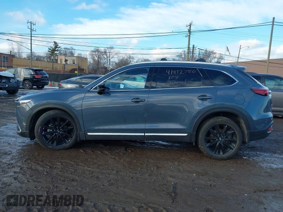 2022 Mazda CX-9 Grand Touring with VIN JM3TCBDYXN0618313, listed as a IAAI auction lot 41452750 with 34,356 mi miles and . Bid and sale history available at DreamBid. Image 14.