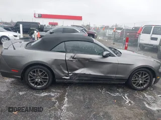 2014 Ford Mustang V6 with VIN 1ZVBP8EM1E5228353, listed as a IAAI auction lot 41525666 with 138,024 mi miles. Bid and sale history available at carsss.com. Image 6.
