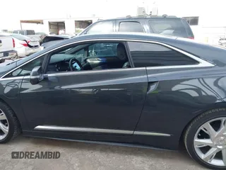 2014 Cadillac ELR z VIN 1G6RL1E44EU602130, wystawiony jako IAAI lot #41890071 z przebiegiem 46 243 mil mil oraz . Historia ofert i sprzedaży dostępna na DreamBid. Obrazek 14.