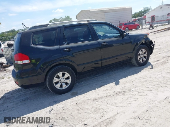 2009 Kia Borrego LX with VIN KNDJJ741X95022410, listed as a IAAI auction lot 41801442 with 163,775 mi miles. Bid and sale history available at carsss.com. Image 4.