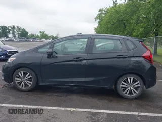 2015 Honda Fit EX-L z VIN 3HGGK5H81FM778816, wystawiony jako IAAI lot #42376942 z przebiegiem 155 374 mil mil oraz . Historia ofert i sprzedaży dostępna na DreamBid. Obrazek 14.