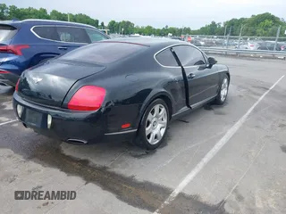 2005 Bentley Continental GT GT z VIN SCBCR63W55C025099, wystawiony jako IAAI lot #42208951 z przebiegiem 123 712 mil mil oraz . Historia ofert i sprzedaży dostępna na DreamBid. Obrazek 4.