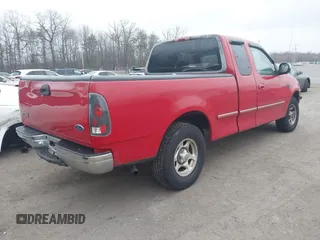 1998 Ford F-150 with VIN 1FTZX17WXWNC05002, listed as a IAAI auction lot 41799463 with 157,453 mi miles and . Bid and sale history available at DreamBid. Image 4.