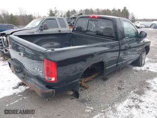 2005 Dodge Ram 1500 SLT with VIN 1D7HU16DX5J597138, listed as a IAAI auction lot 41319558 with 138,671 mi miles. Bid and sale history available at carsss.com. Image 4.