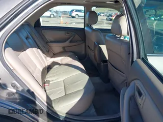 1998 Toyota Camry LE z VIN 4T1BG28KXWU248887, wystawiony jako IAAI lot #41507392 z przebiegiem Nie podano mil oraz . Historia ofert i sprzedaży dostępna na DreamBid. Obrazek 8.