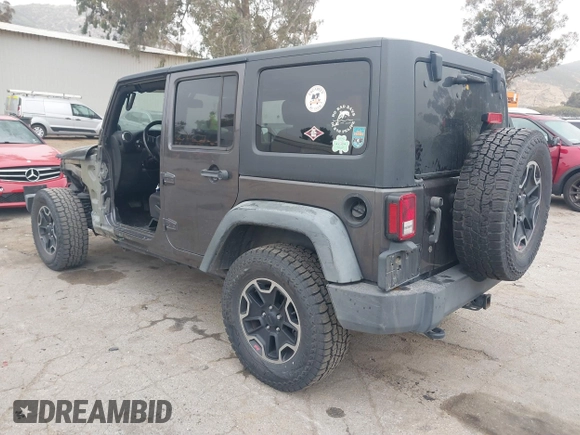 2014 Jeep Wrangler Unlimited Sport with VIN 1C4BJWDG7EL244749, listed as a IAAI auction lot 41871127 with 128,420 mi miles and . Bid and sale history available at DreamBid. Image 3.