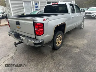 2015 Chevrolet Silverado 1500 LT with VIN 1GCVKRECXFZ221116, listed as a Copart auction lot 56621055 with 198,583 mi miles and Clean Title. Bid and sale history available at DreamBid. Image 4.