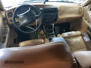 1996 Ford Explorer XL with VIN 1FMDU32X6TUD64045, listed as a Copart auction lot 65942264 with 138,750 mi miles and Salvage title. Bid and sale history available at DreamBid. Image 8.
