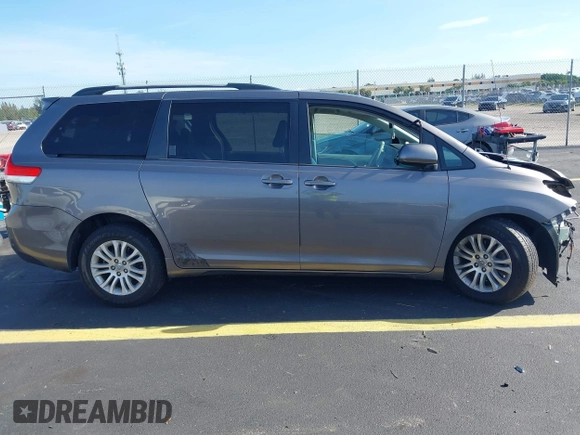 2011 Toyota Sienna XLE AAS with VIN 5TDYK3DC9BS117594, listed as a IAAI auction lot 42553026 with 156,808 mi miles and . Bid and sale history available at DreamBid. Image 14.