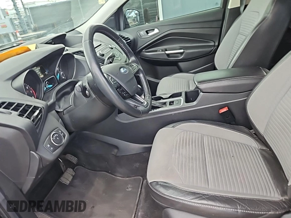 2018 Ford Escape SE z VIN 1FMCU9GDXJUA69802, wystawiony jako IAAI lot #42413413 z przebiegiem 92 564 mil mil oraz . Historia ofert i sprzedaży dostępna na DreamBid. Obrazek 10.