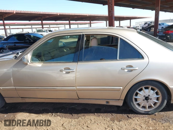 2001 Mercedes-Benz E-Class with VIN WDBJF65J11B232599, listed as a IAAI auction lot 41517879 with 173,366 mi miles. Bid and sale history available at carsss.com. Image 14.