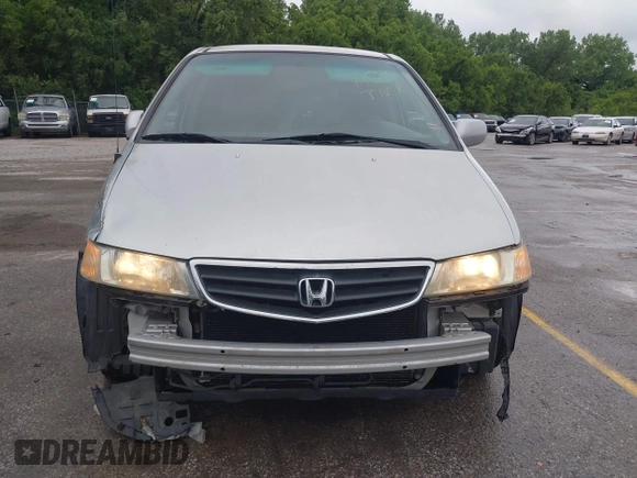 2004 Honda Odyssey EX-L with VIN 5FNRL18934B076486, listed as a IAAI auction lot 42315160 with 209,467 mi miles and . Bid and sale history available at DreamBid. Image 6.