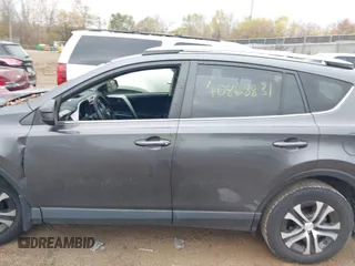 2017 Toyota RAV4 LE with VIN JTMBFREV3HJ704411, listed as a IAAI auction lot 40868831 with 102,729 mi miles. Bid and sale history available at carsss.com. Image 14.