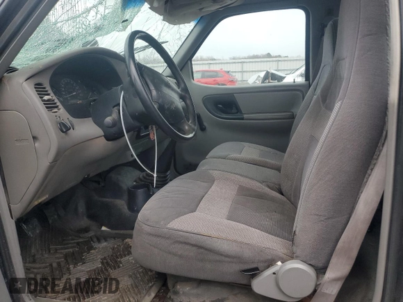 1999 Ford Ranger XL with VIN 1FTYR10C8XTA00586, listed as a Copart auction lot 42546635 with 176,902 mi miles and Salvage title. Bid and sale history available at DreamBid. Image 7.