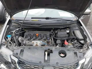 2014 Honda Civic LX z VIN 2HGFB2F53EH512715, wystawiony jako IAAI lot #42300257 z przebiegiem 77 609 mil mil oraz . Historia ofert i sprzedaży dostępna na DreamBid. Obrazek 10.