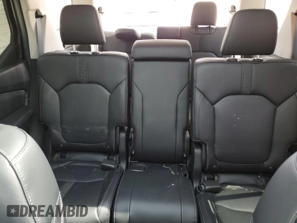 2024 Honda Pilot Touring z VIN 5FNYG1H74RB036990, wystawiony jako Copart lot #56254385 z przebiegiem Nie podano mil oraz Szkoda całkowita • Salvage title. Historia ofert i sprzedaży dostępna na DreamBid. Obrazek 10.