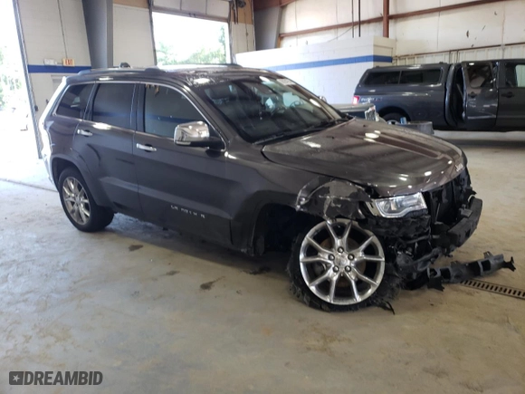 2014 Jeep Grand Cherokee Summit with VIN 1C4RJFJG5EC388545, listed as a Copart auction lot 68284754 with 189,897 mi miles and Salvage Title. Bid and sale history available at carsss.com. Image 4.