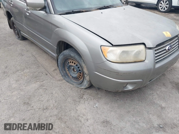 2006 Subaru Forester 2.5 X w/Premium Pkg with VIN JF1SG656X6H705960, listed as a IAAI auction lot 41872470 with 228,095 mi miles. Bid and sale history available at carsss.com. Image 6.