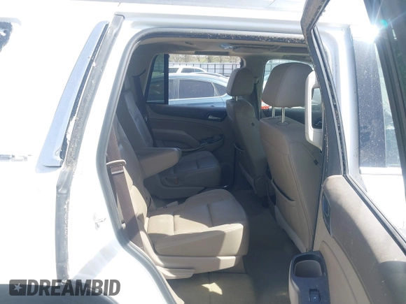 2017 GMC Yukon SLT with VIN 1GKS1BKC9HR278190, listed as a IAAI auction lot 41824213 with 104,323 mi miles. Bid and sale history available at carsss.com. Image 8.