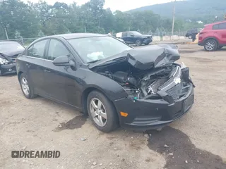 2014 Chevrolet Cruze 1LT with VIN 1G1PC5SB1E7136307, listed as a IAAI auction lot 42544810 with 113,073 mi miles and . Bid and sale history available at DreamBid. Image 1.